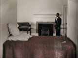 Buy Man Stands in Thomas Jefferson's Bedroom Next to His Bed at AllPosters.com