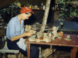 Buy Woman Mends Broken Pottery Found in an Archeological Excavation at AllPosters.com