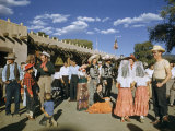 Buy People in Hispanic and Cowboy Clothing Mingle in Plaza at Fiesta at AllPosters.com