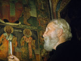 Buy Greek Priest Inspects Byzantine Paintings in Basilica of the Nativity at AllPosters.com