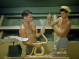 Buy Man Holds Cape Cobra as His Son Force-Feeds it to Assure Venom Supply at AllPosters.com