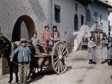 Children Ride on a Cart Lead by a Donkey