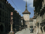 Buy Horse-Drawn Carriage, Cars, and Bicycle Share Road Below Clock Tower at AllPosters.com