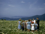 Buy Minister Talks to Children Standing in Meadow Overlooking Valley at AllPosters.com