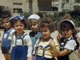 Buy Orphans Looking at Camera Hold Hands at AllPosters.com