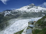 Buy Hotel Overlooks and Is Dwarfed by the Rhone Glacier at AllPosters.com