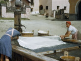 Buy Women Wash Sheets in a Communal Village Water Basin and Pump at AllPosters.com