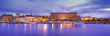 Buildings at the Waterfront Lit Up at Dusk, Stockholm, Sweden
