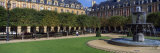 Buy Fountain and Trees in Front of a Building, Place Des Vosges, Paris, Ile-De-France, France at AllPosters.com