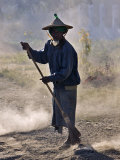 Buy Burma, Mrauk U, an Old Man Sweeps the Road at Mrauk U, Myanmar at AllPosters.com