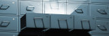 Light Coming Out from Three Open Locker Drawers