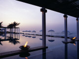 Reflections in the Still Water of the Infinity Pool at Sunset, at the Chedi Hotel