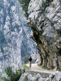 Trekker Walks the Trail Through the Cares Gorge, One of the Most Popular Walks in Spain