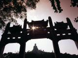 Tian Tan Buddhais Framed by a Chinese Gate at Ngong Ping Photographic Print