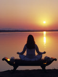 Yoga on a Saddle Bench Watching the Sun Go Down across the Zambesi River, Zambia Photographic Print