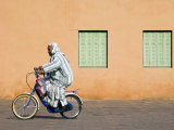 Buy Man with Bicycle Infront of Red Rose Walls and Minaret at AllPosters.com