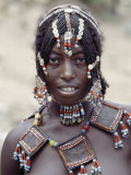 Buy Young Afar Girl at Senbete Market, Her Elaborate Hairstyle and Beaded Jewellery at AllPosters.com