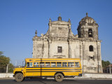 Leon, American Yellow Bluebird Bus Driving Past San Juan Church, Nicaragua