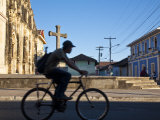 Granada, Man Riding Bike Past Iglesia De La Merced, Nicaragua