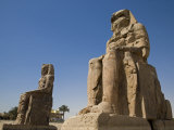 Colossi of Memnon Stand at Entrance to the Ancient Theban Necropolis on West Bank of Nile at Luxor