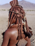 Buy Himba Woman in Traditional Attire, Her Body Gleams from a Red Ochre Mixture of Red Ochre, Namibia at AllPosters.com