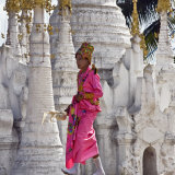 Buy Myanmar, Burma, Lake Inle, A Young Novitiate Passes an Ornate Buddhist Shrine at AllPosters.com