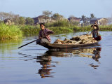 Buy Burma, Lake Inle, Women Taking Wood to Market by Boat, Myanmar at AllPosters.com