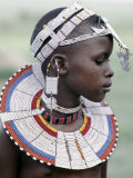 Buy White Beadwork and Circular Scar on Cheek of This Maasai Girl, from the Kisongo Group at AllPosters.com