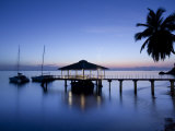 Seychelles, Praslin Island, Anse Bois De Rose, Pier at the Coco De Mer Hotel, Sunset