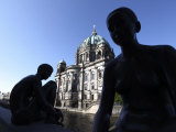Silhouettes of Riverside Figure Sculptures, Dom Beyond, Spree River, Berlin, Germany