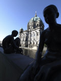 Silhouettes of Riverside Figure Sculptures, Dom Beyond, Spree River, Berlin, Germany