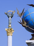 Statue of a Blue Globe with Doves of Peace and Symbol of Kiev Statue
