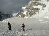 Two Men Ski Towards the Moonflower Buttress, Denali National Park, Alaska