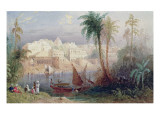 A View of an Indian City Beside a River, with Boats on the River and Figures in the Foreground