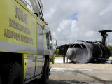 Guam's Wonpat Airport Practices Putting Out a Fire on the Aircraft Fire Trainer