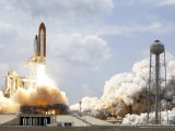 Buy Space Shuttle Atlantis Lifts Off from its Launch Pad at AllPosters.com
