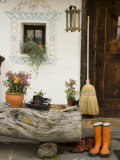 Buy Boots, a Broom and Flowers Outside a Chalet at AllPosters.com