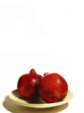Buy Two Pomegranates on Plate on White Background at AllPosters.com