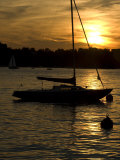 Sailboat Silhouetted on Lake Zurich at Sunset