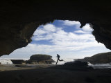 Hiker Explores Interesting Rock Formations on the West Coast