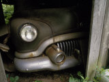 Buy Headlight and Rusted Bumper of a 1951 Car Peer from a Barn at AllPosters.com