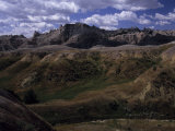 Buy Colorful Hills under a Cloudy Sky in the Western Badlands at AllPosters.com
