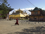 Buy Monk Crosses a Courtyard in a Monastery at AllPosters.com