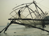 Buy Chinese Style Fishing Nets Dip into the Arabian Sea at AllPosters.com