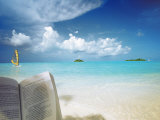 Reading Book on the Beach, Windsurfing and Islands in the Distance, the Maldives, Indian Ocean