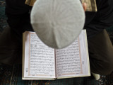 Buy Kyrgyz Man Reads the Koran During a Friday Prayer Inside a Mosque in Osh, Southern Kyrgyzstan at AllPosters.com