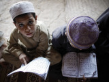 Buy Afghan Refugee Children Read Verses of the Quran During a Daily Class at a Mosque in Pakistan at AllPosters.com