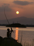 Pakistan Boy Fishing at Rawal Lake in the Suburb of Pakistani Capital Islamabad