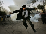 Buy Pakistani Lawyer Runs Away from Tear Gas Fired by Police Officers During a Protest in Islamabad at AllPosters.com