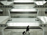 Buy Passenger Arrives at the T4 Barajas Airport at AllPosters.com